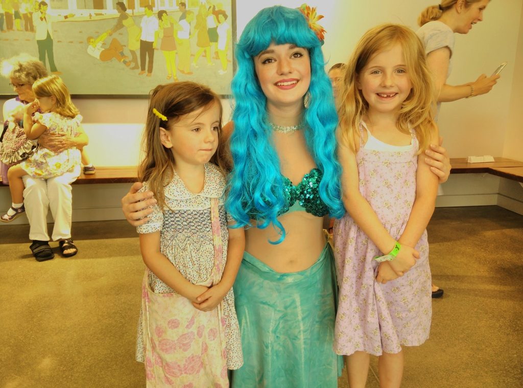 Posing with the little Mermaid.