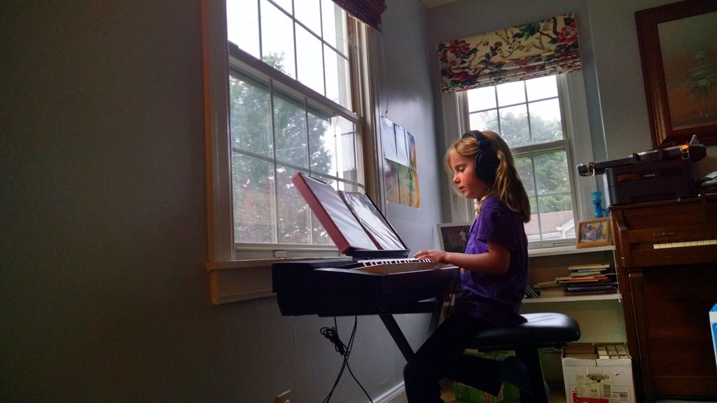 Practicing on the new keyboard.